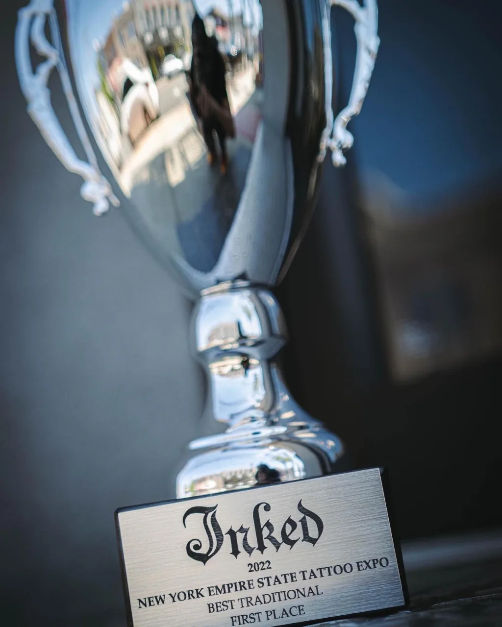 The Inked trophy for the NY Empire State Tattoo Expo 2022, plaque engraved Best Traditional, First Place